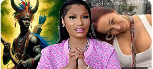 Cardi B wearing Ochosi elekes.